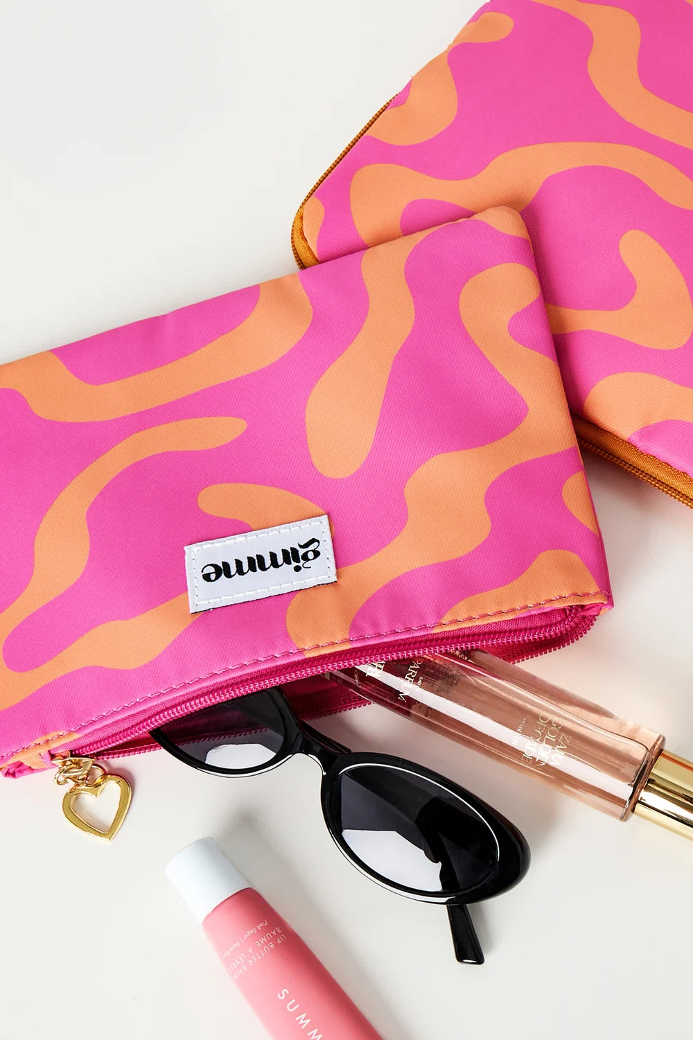 Make-uptassen gemengde kleuren - fuchsia oranje - voorbeeld open tas - online kopen bij niniforyou