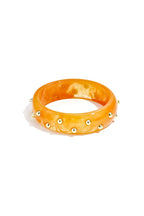 Statement armband met dots - goud oranje - online kopen bij niniforyou